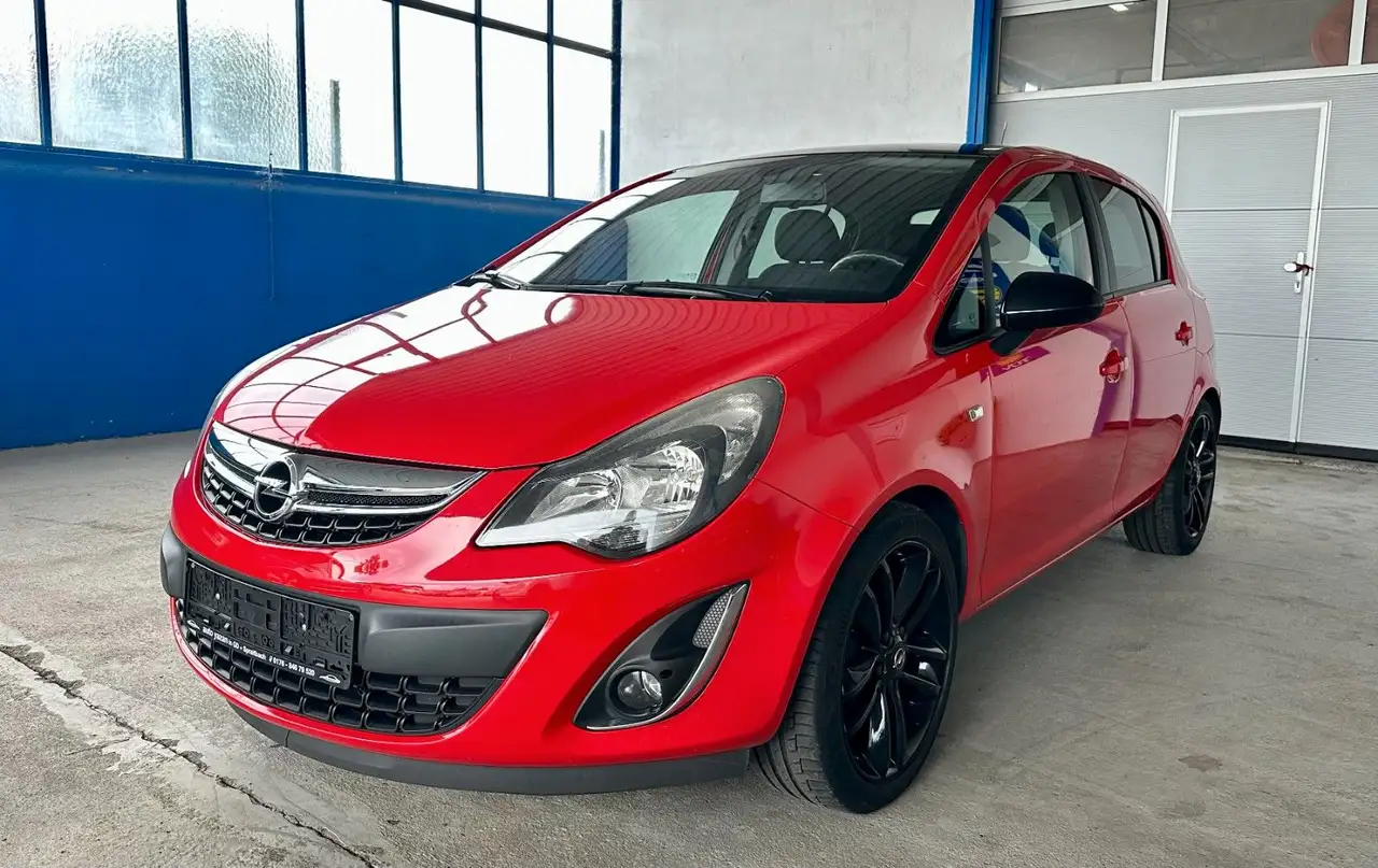 Opel Corsa D Color Edition / 1.Hand / Navi / SHZ — photo 1 of 19