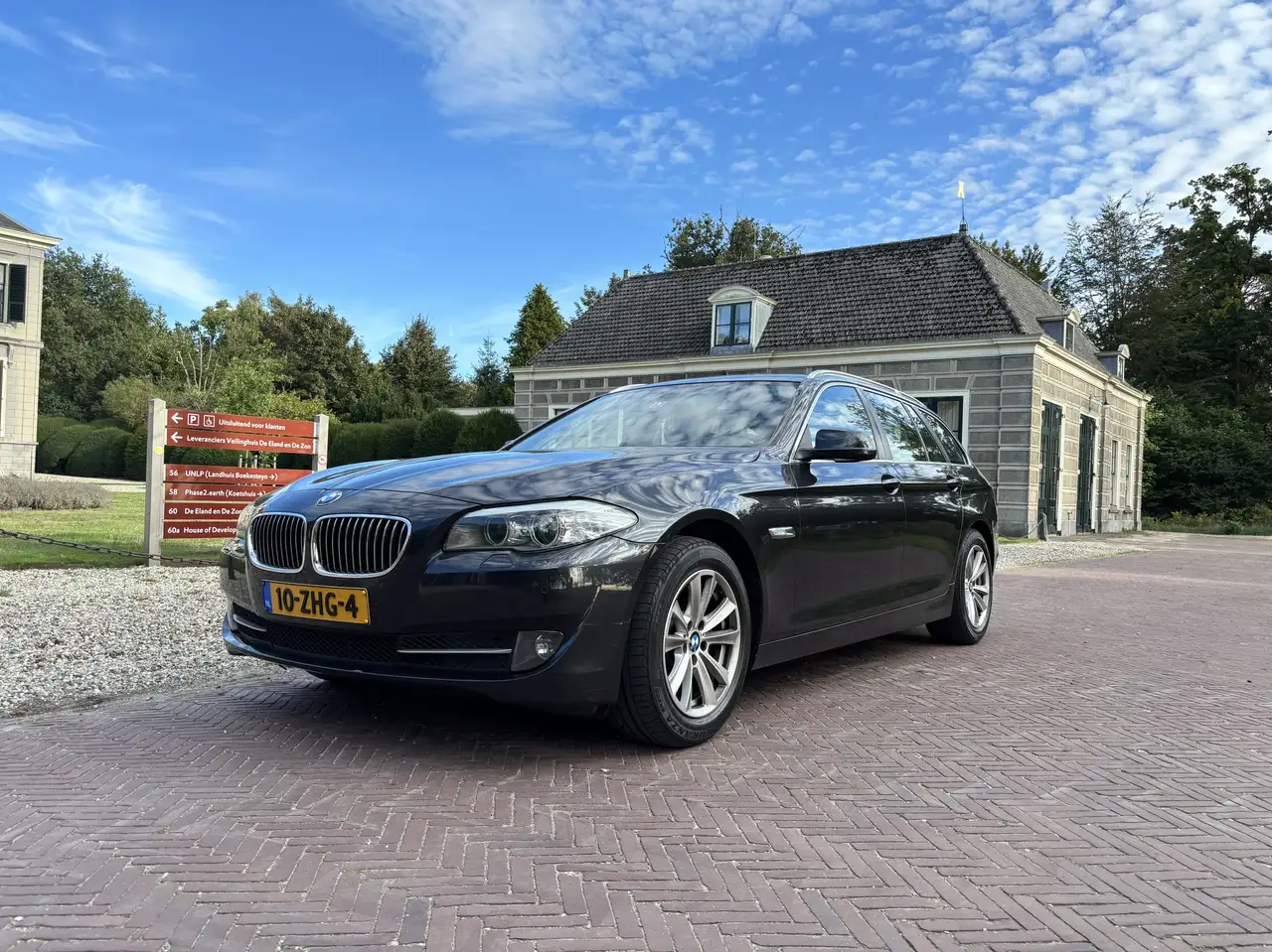 BMW 520 Touring High Executive Automaat — photo 1 of 14