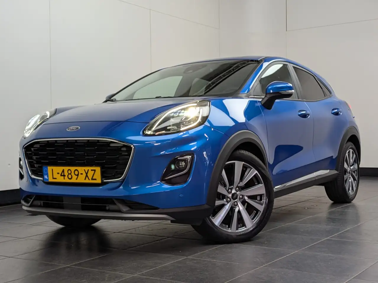 Ford Puma 1.0 EcoBoost Hybrid Titanium X | Achteruitrijcamer — photo 1 of 11