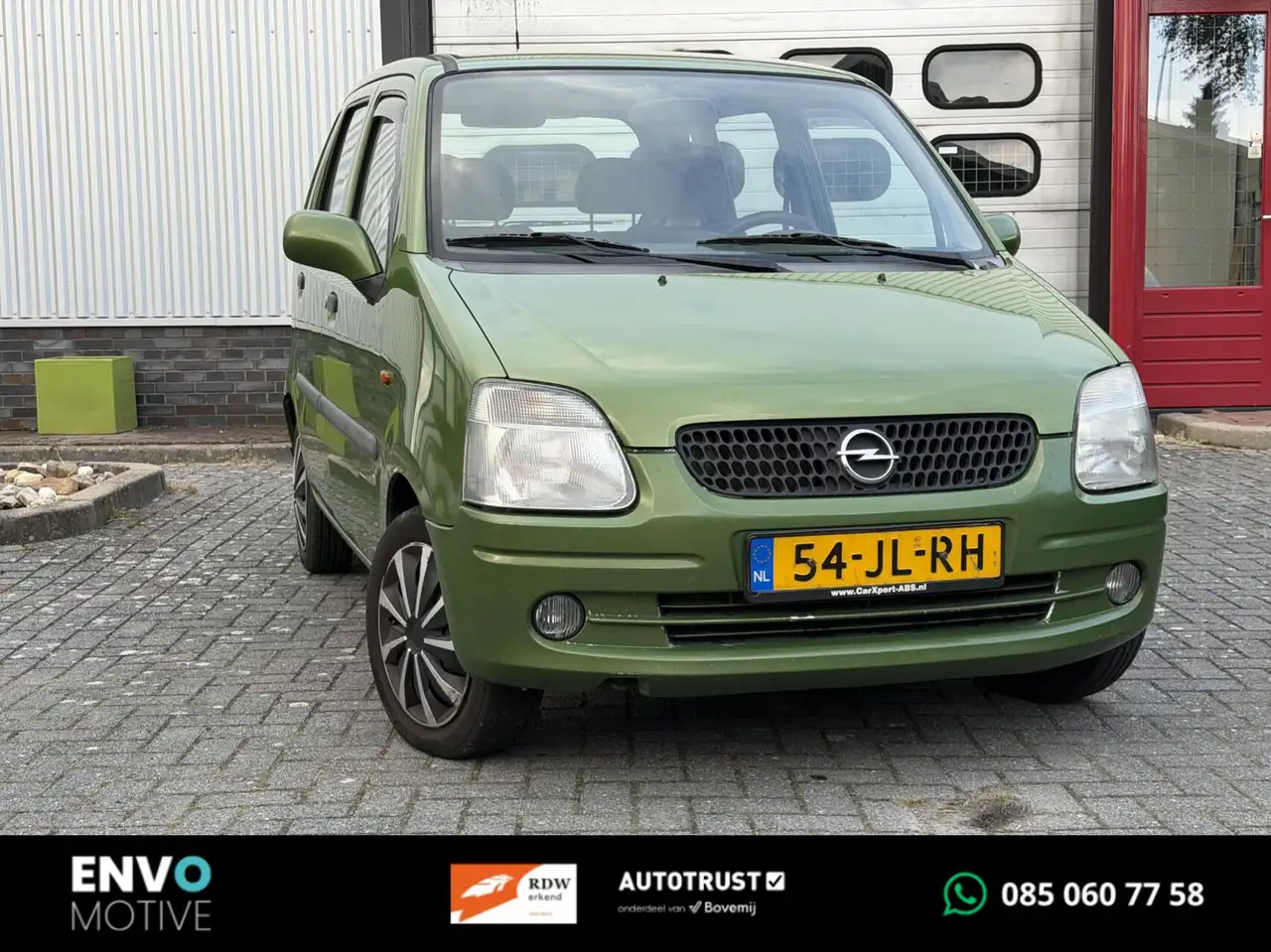Opel Agila 1.2-16V Comfort met lange APK — photo 1 of 12