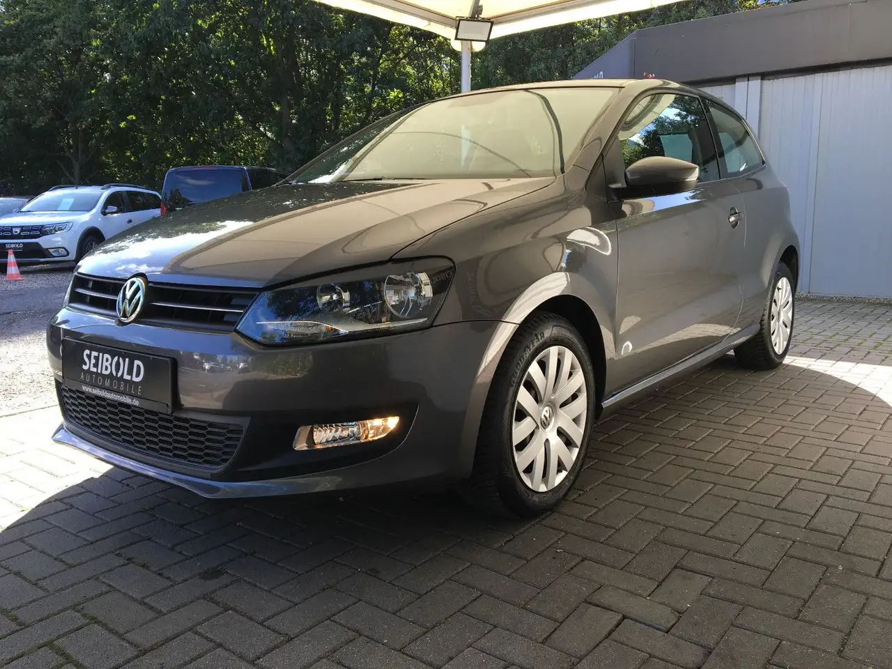 Volkswagen Polo 1.2 TSI Comfortline/1.H/Klima/Temp/PDC/Allw — photo 1 of 25