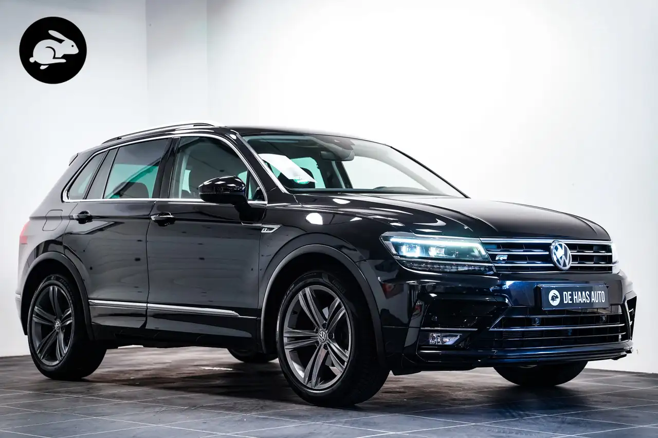 Volkswagen Tiguan 1.4 TSI ACT R-Line|Trekhaak|Virtual|LED|Stoelverwa — photo 1 of 21