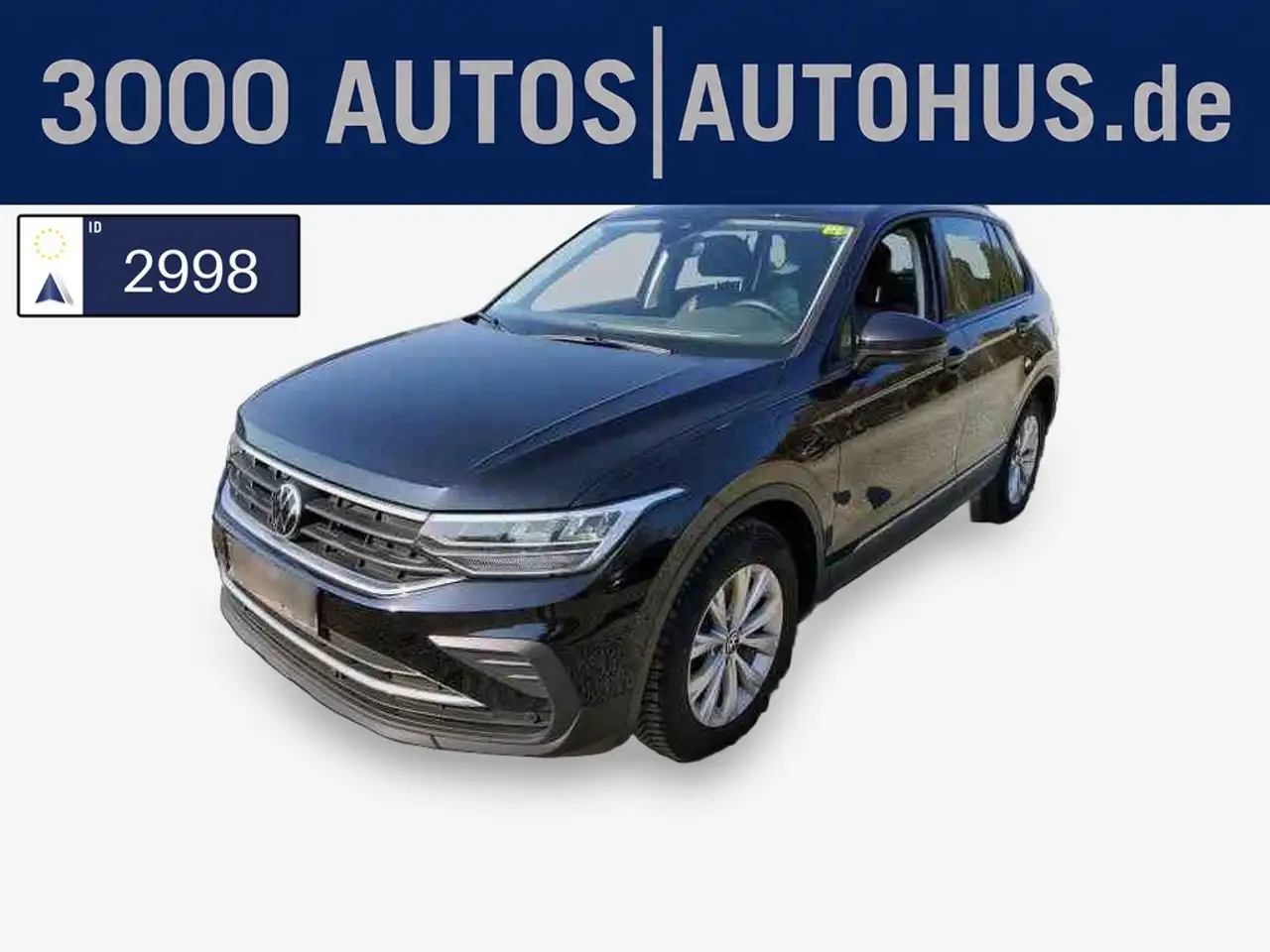 Volkswagen Tiguan — photo 1 of 16