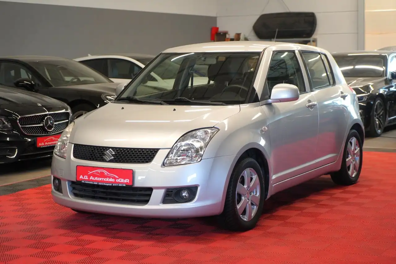 Suzuki Swift 1.3 Lim. 1.Hand*Unfallfrei*Klimaanlage* — photo 1 of 25
