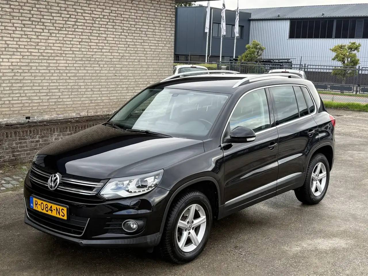 Volkswagen Tiguan 1.4 TSI Sport&Style — photo 1 of 20