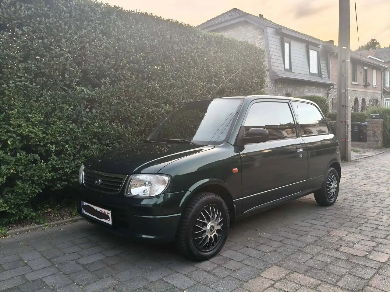 Daihatsu Cuore 1.0i 12v GLXA — photo 1 of 6