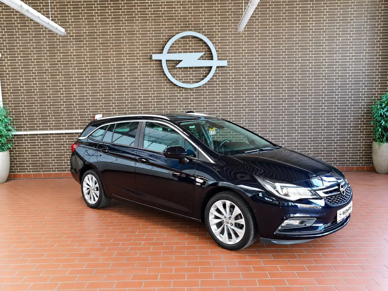 Opel Astra K Sports Tourer 120 Jahre Winter/Apple CP — photo 1 of 15