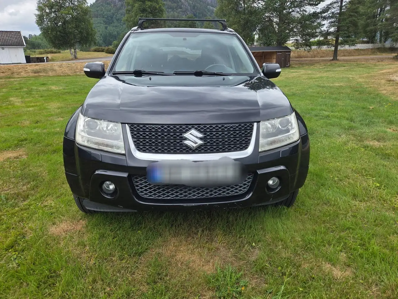 Suzuki Grand Vitara 1.9 DDiS 4x4 — photo 1 of 20