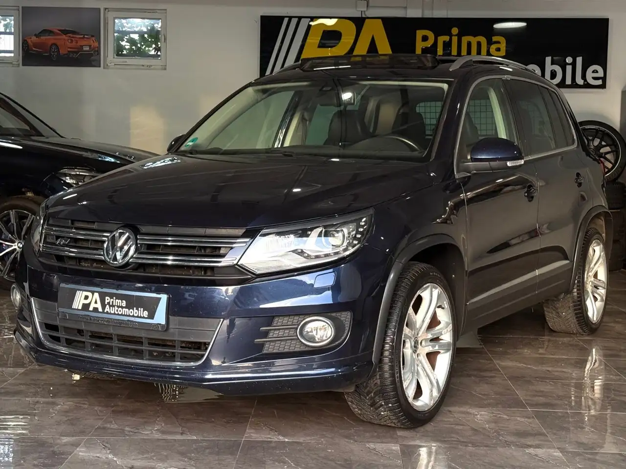 Volkswagen Tiguan 2.0 TSI DSG R-Line 4Motion / Navi Kamera — photo 1 of 25