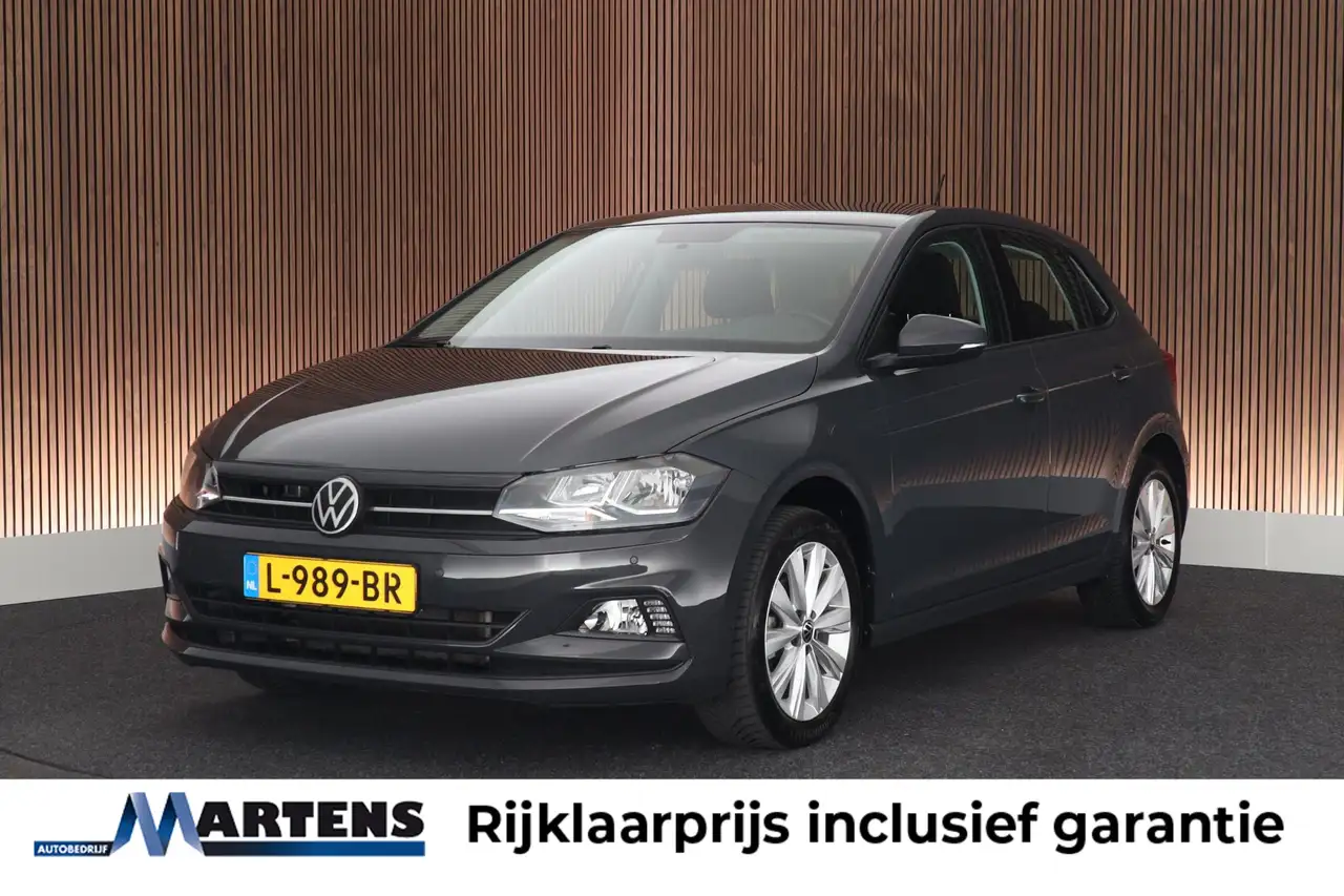 Volkswagen Polo 1.0 TSI 95pk Comfortline Parkeersensoren Navigatie — photo 1 of 40