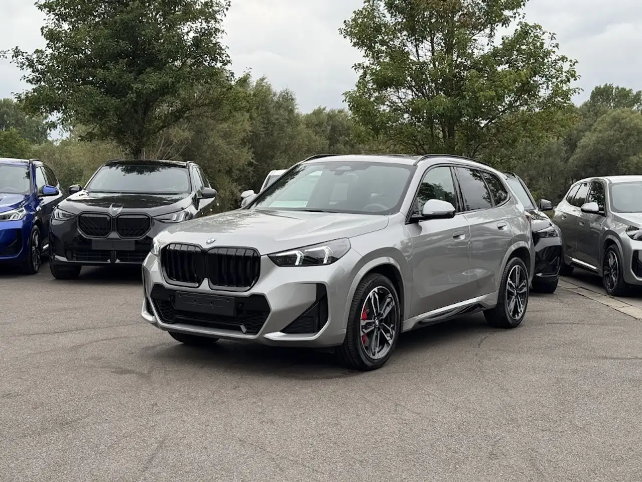 BMW X1 sDrive18i M Sport Pro / PANO / CAM / KEYLESS / SPOILER / NAVI / CARPLAY / VERW ZETELS / ADPT LED / M BRAKES / ... — photo 1 of 15