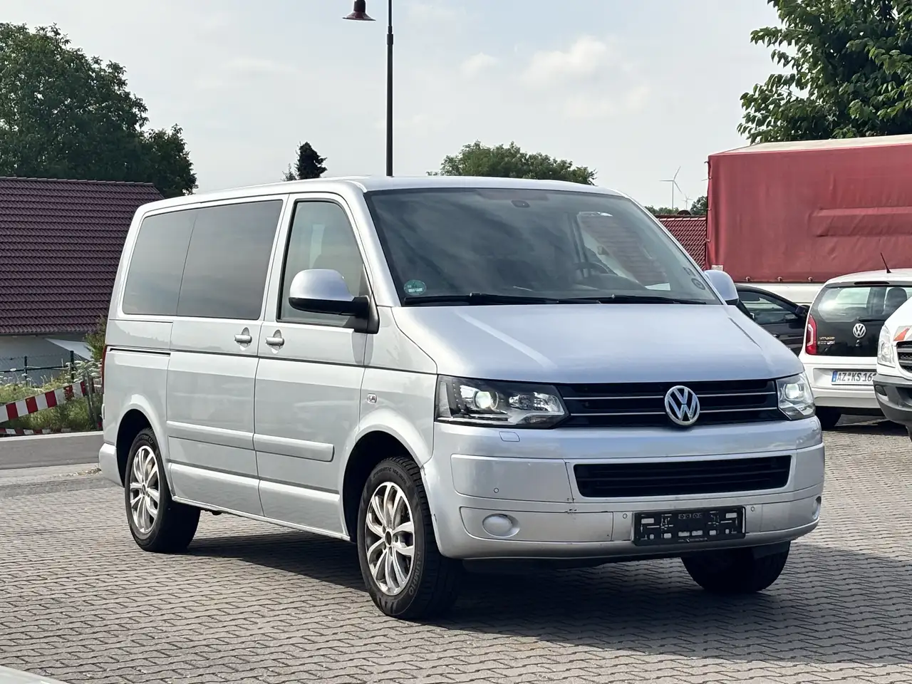 Volkswagen T5 Multivan Multivan 4Motion Comfortline 4Motion 7-Sitzer + 1.HAND + AHK+XENON+NAVI — photo 1 of 15