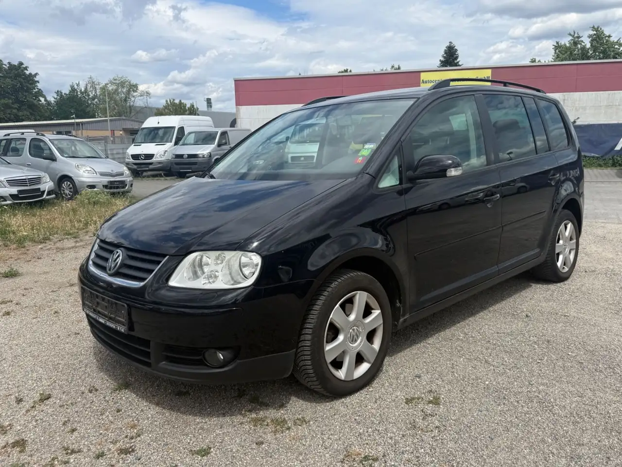 Volkswagen Touran Goal 1.6 FSI Klimaautom. — photo 1 of 14
