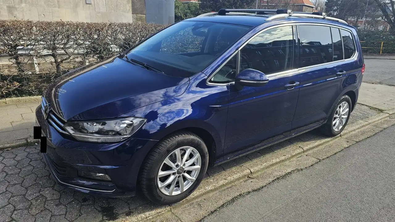 Volkswagen Touran Touran 1.5 TSI Highline Business OPF DSG Highline Business — photo 1 of 7