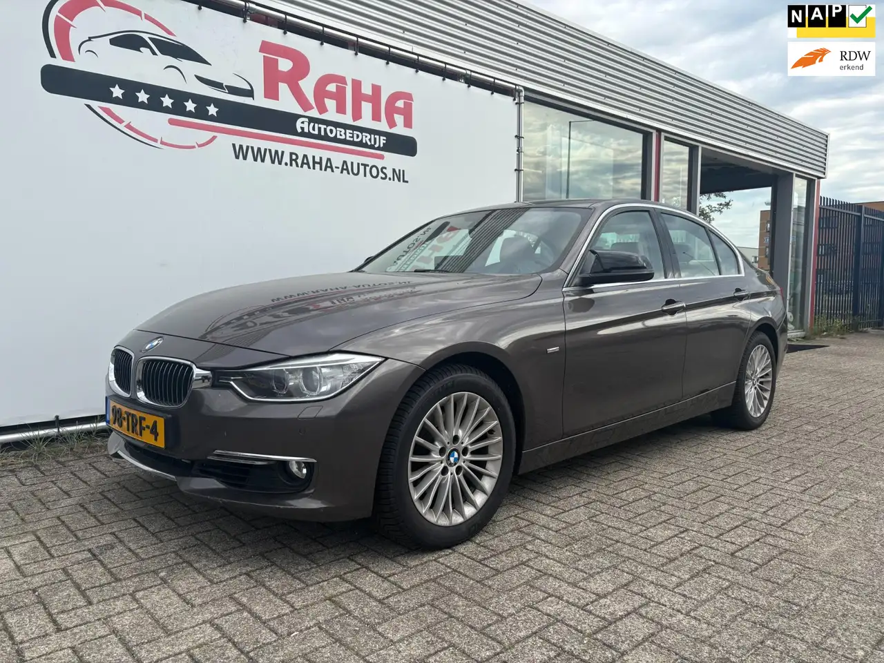 BMW 320 3-serie 320i High Executive — photo 1 of 18