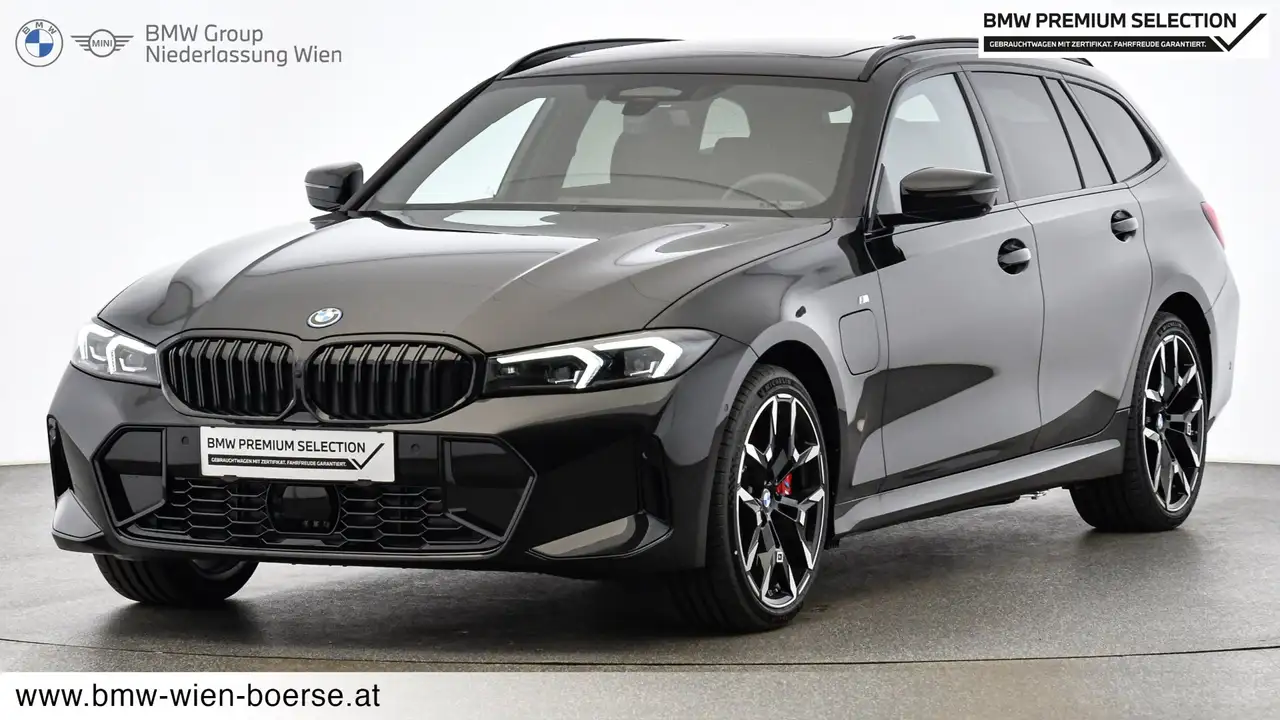 BMW 330 e xDrive — photo 1 of 28