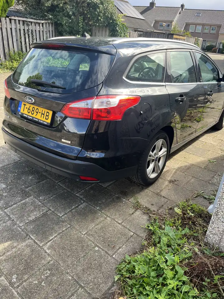 Ford Focus 1.0 EcoB. Titanium — photo 1 of 12