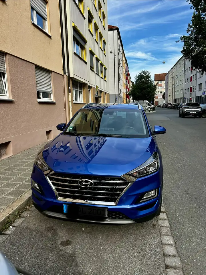 Hyundai TUCSON blue 1.6 CRDi 4WD DCT Trend — photo 1 of 20