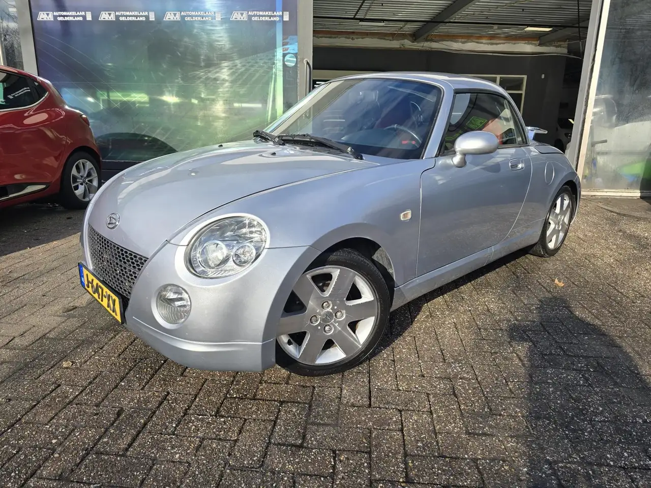 Daihatsu Copen 1.3-16V | 12MND GARANTIE | NIEUWE APK | LEDER | AI — photo 1 of 33