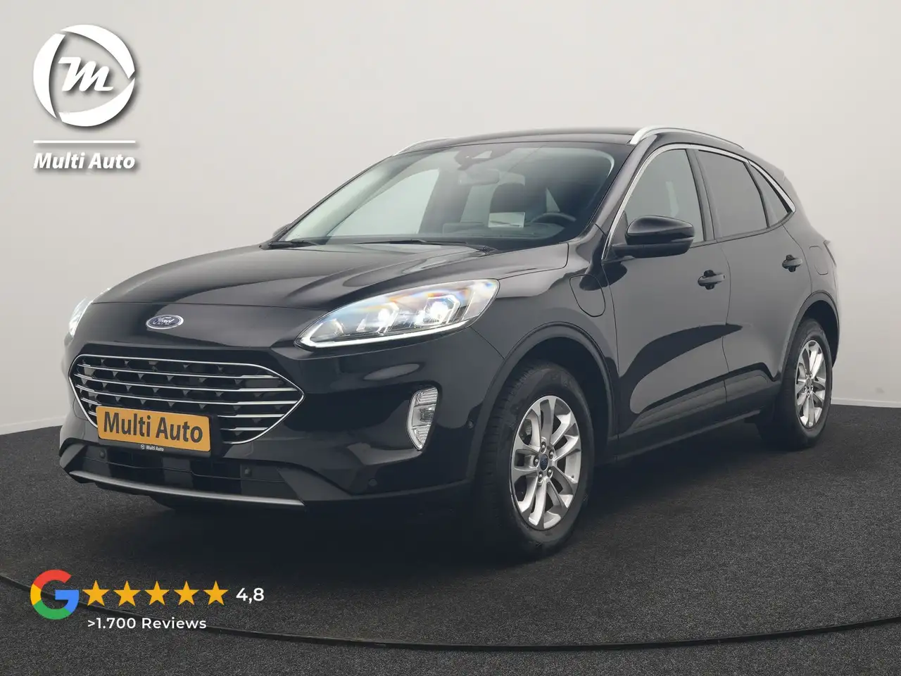 Ford Kuga 2.5 PHEV Titanium 225pk Dealer O.H. | Trekhaak Afn — photo 1 of 40