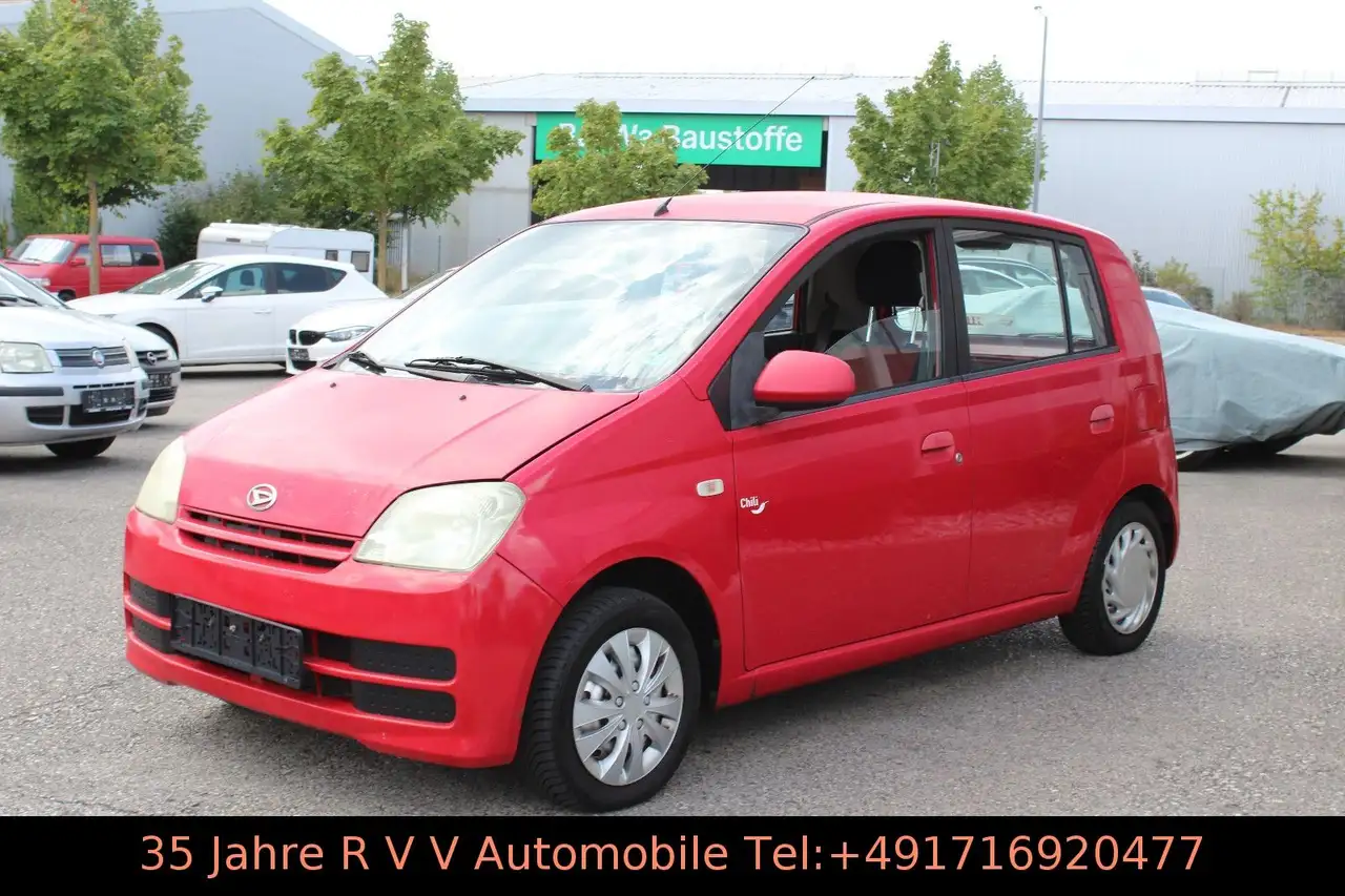 Daihatsu Cuore 1.0 Plus, 1.Hand, Klima — photo 1 of 18