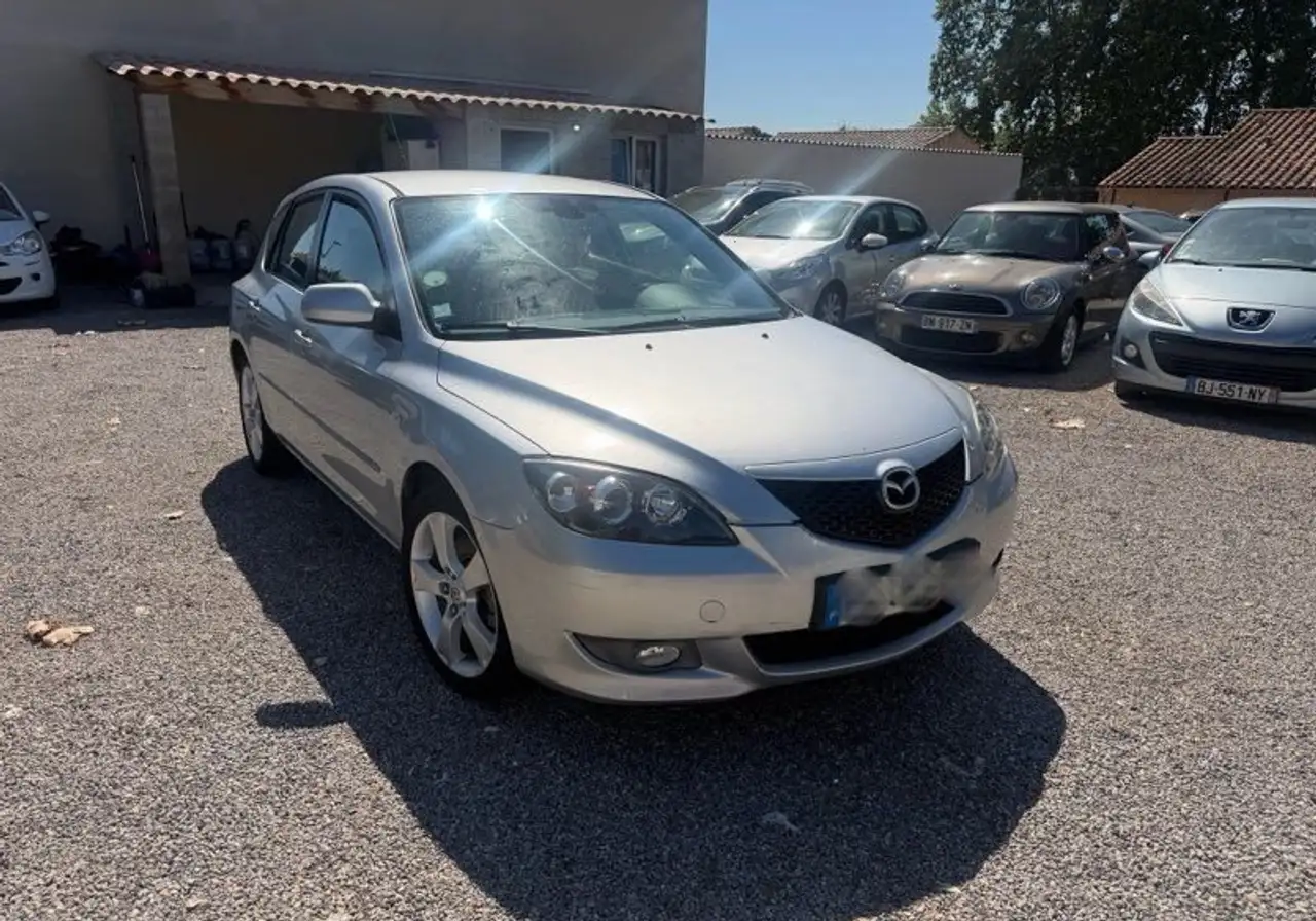 Mazda 3 — photo 1 of 5