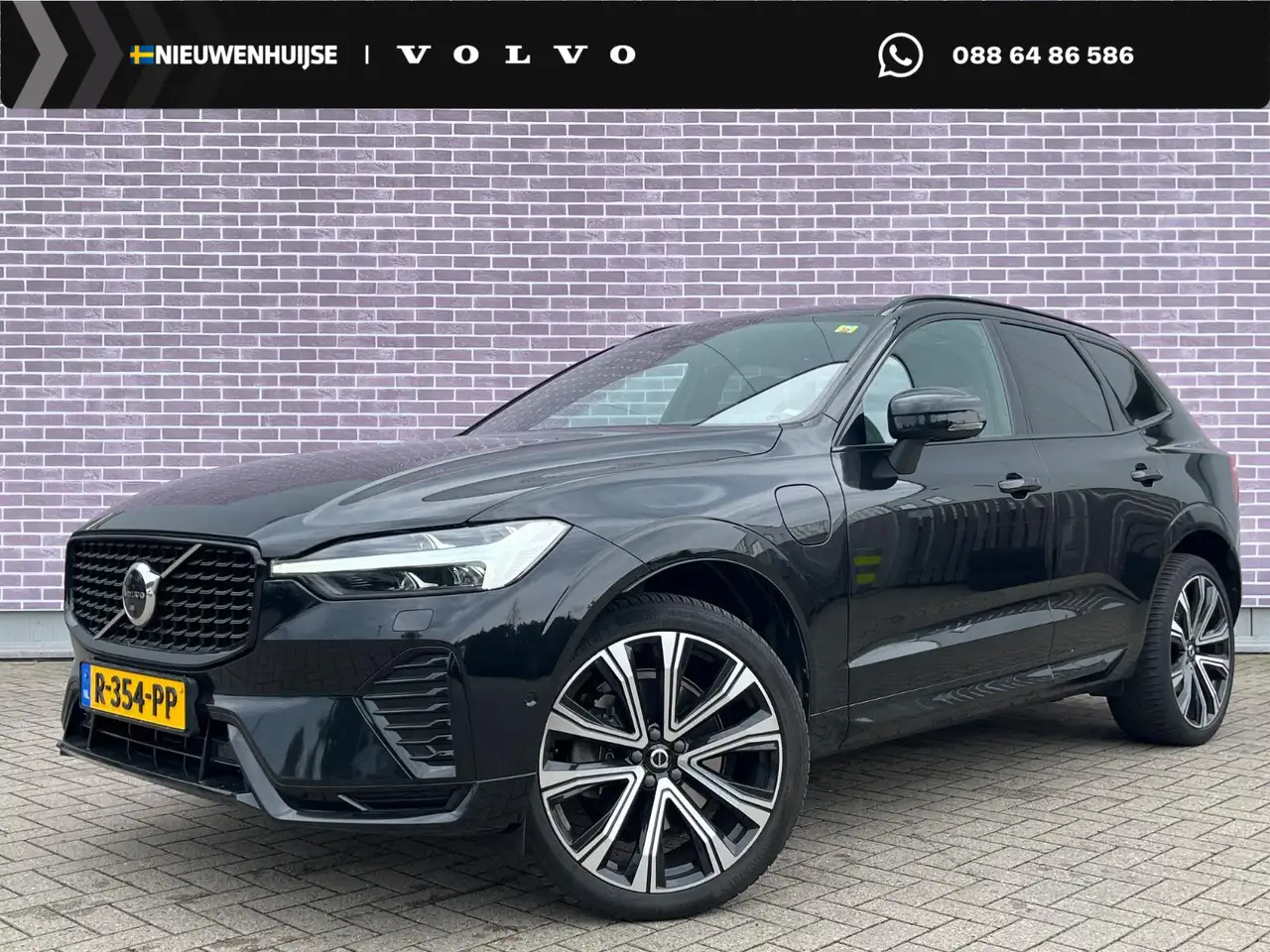 Volvo XC60 2.0 T6 Plug-in hybrid AWD R-Design | Panorama dak — photo 1 of 8