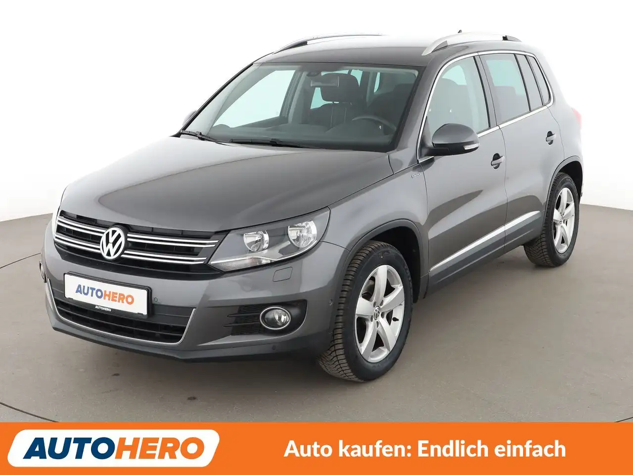 Volkswagen Tiguan 1.4 TSI Lounge Sport & Style BMT*NAVI*PDC*SHZ* — photo 1 of 28