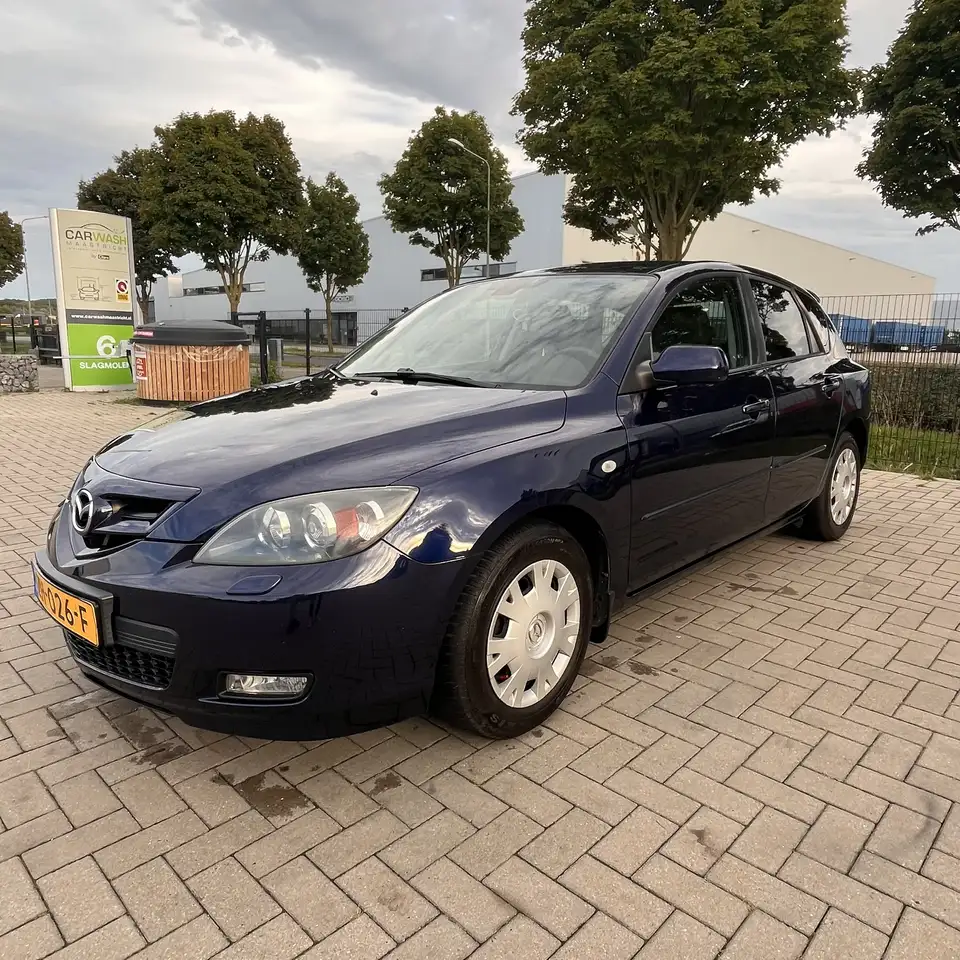 Mazda 3 1.6 Sport Active — photo 1 of 15