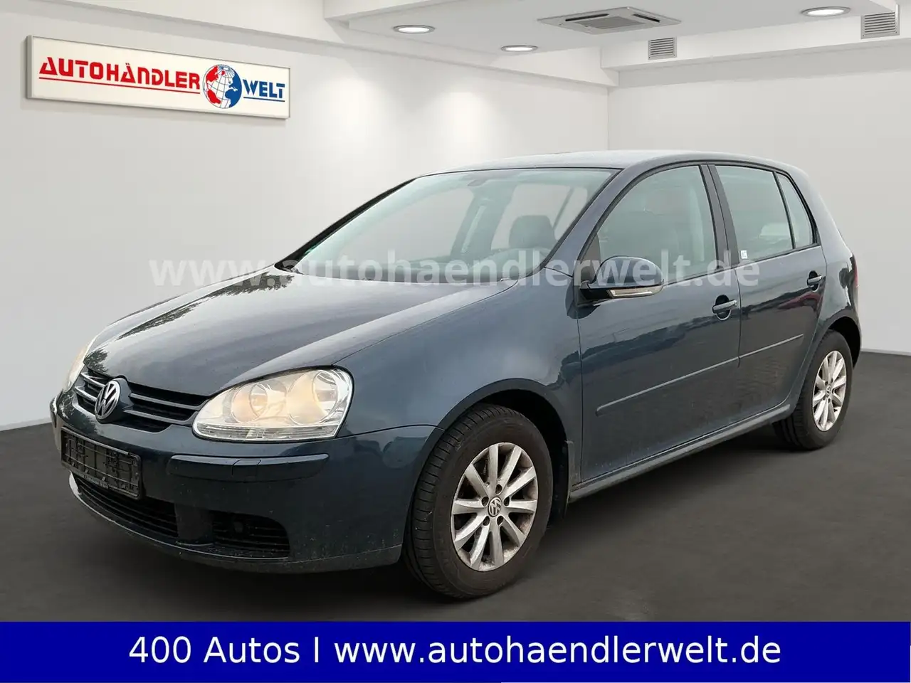 Volkswagen Golf V 1.6 Comfortline — photo 1 of 19