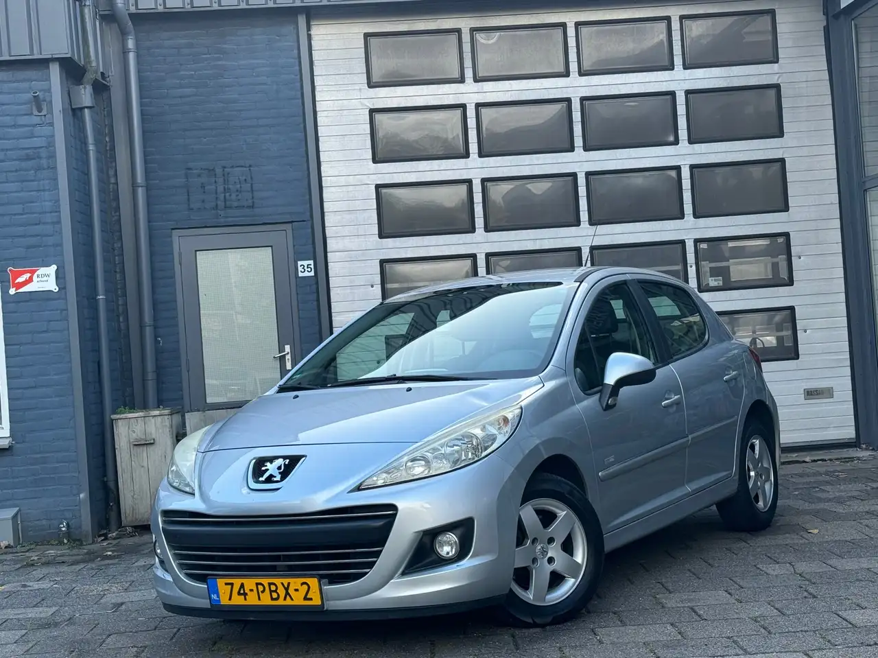 Peugeot 207 1.4 VTi Millesim 200 | Airco | Cruise | LMV | 5-DR — photo 1 of 11