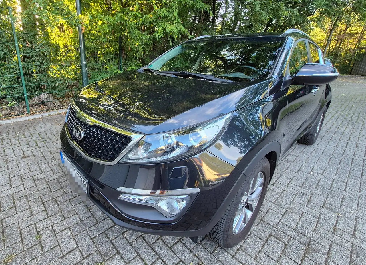 Kia Sportage — photo 1 of 20