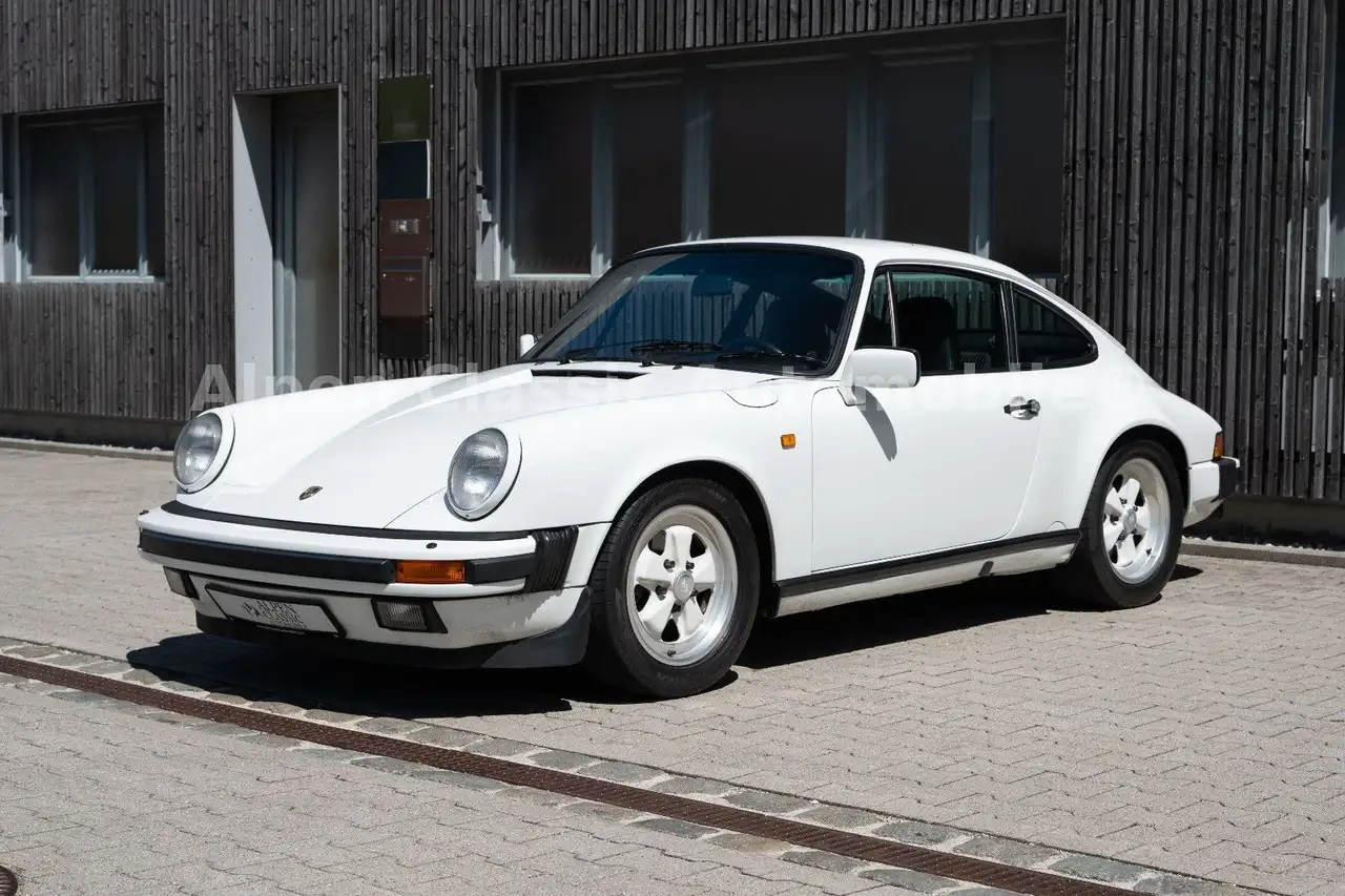 Porsche 911 Carrera Coupe Schiebedach, TÜV — photo 1 of 40