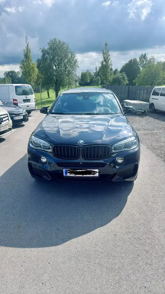 BMW X6 xDrive30d — photo 1 of 12