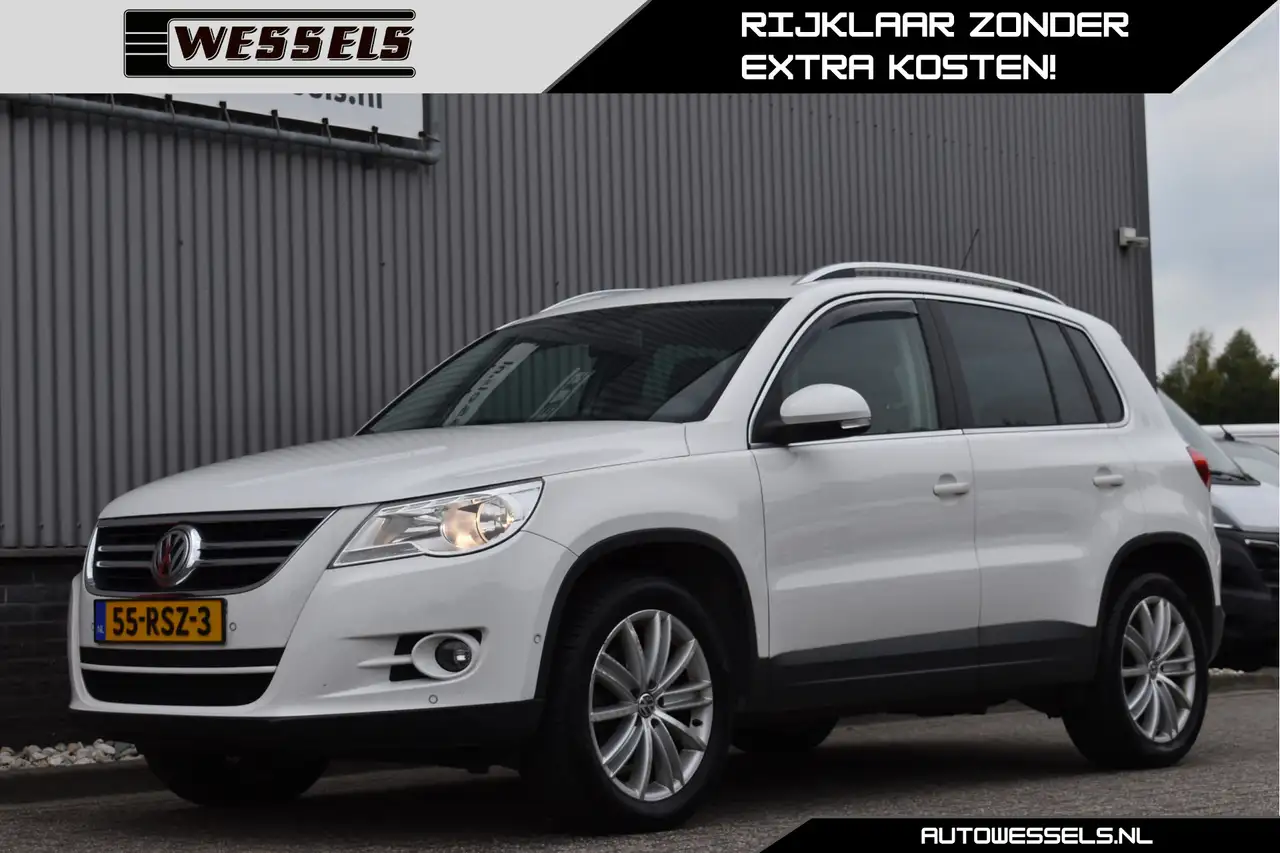 Volkswagen Tiguan 1.4 TSI Sport&Style Cruise control, Trekhaak, NL a — photo 1 of 27