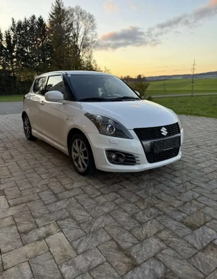 Suzuki Swift Sport 1.6 VVT — photo 1 of 16