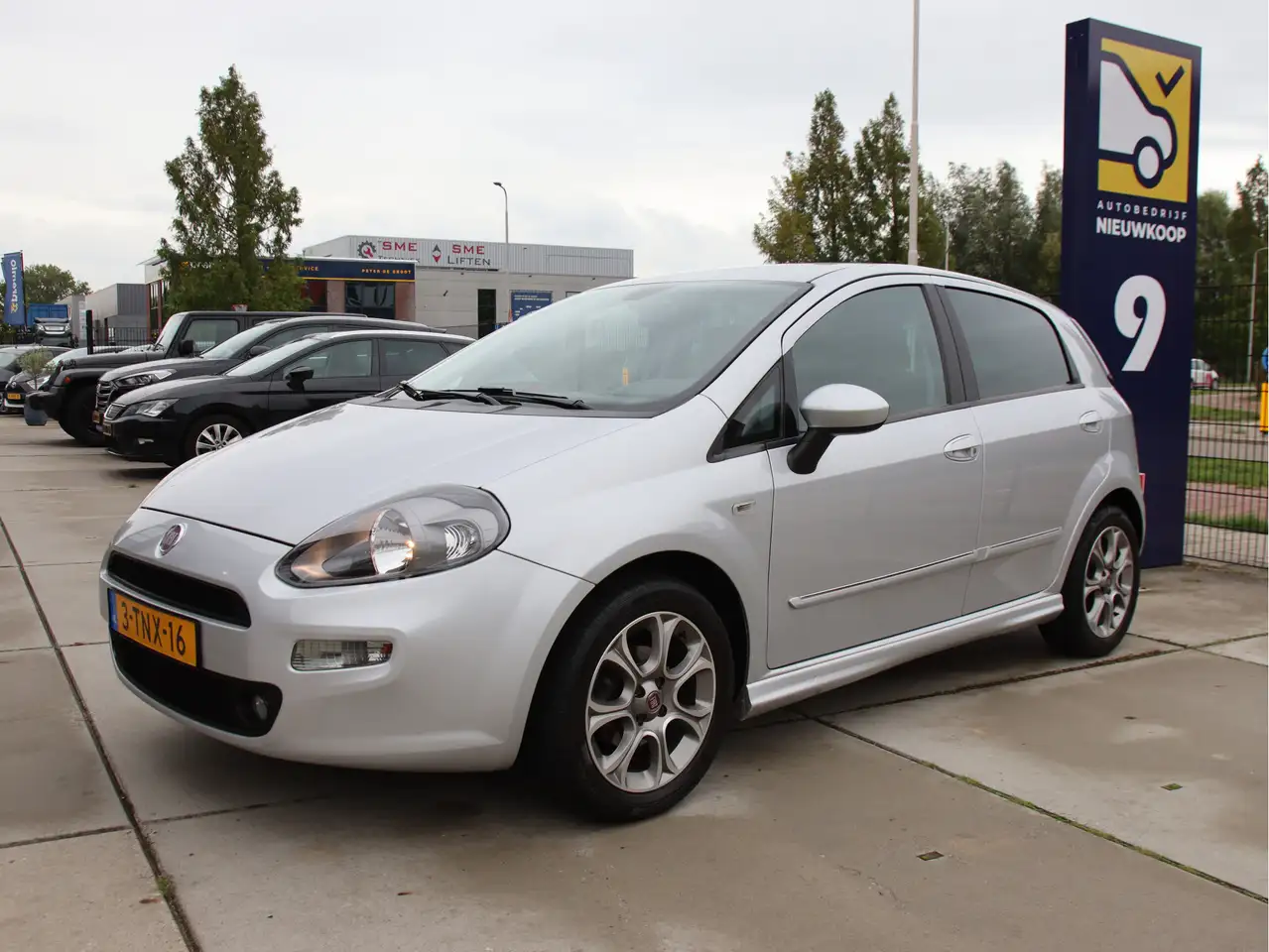 Fiat Punto Evo 0.9 TwinAir Lounge Cruise-Climate, PDC, Trekhaak, — photo 1 of 40