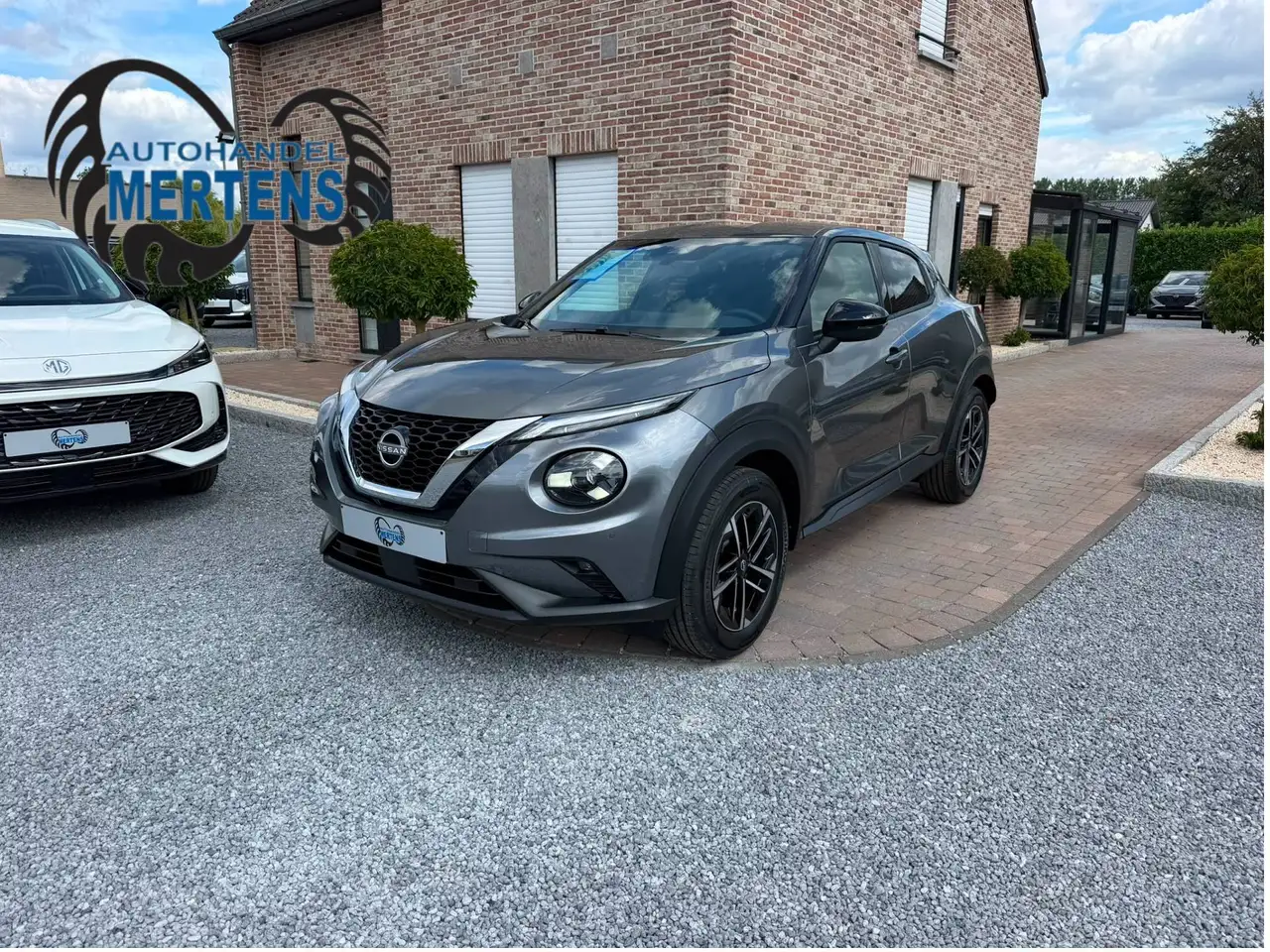 Nissan Juke 1.0 DIG-T 114PK DCT N-Connecta + COLD/PACK NIEUW 0KM — photo 1 of 40