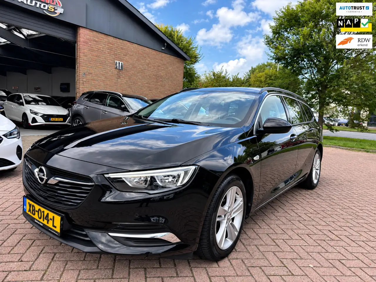 Opel Insignia Sports Tourer 1.5 Turbo Business+ Automaat — photo 1 of 19
