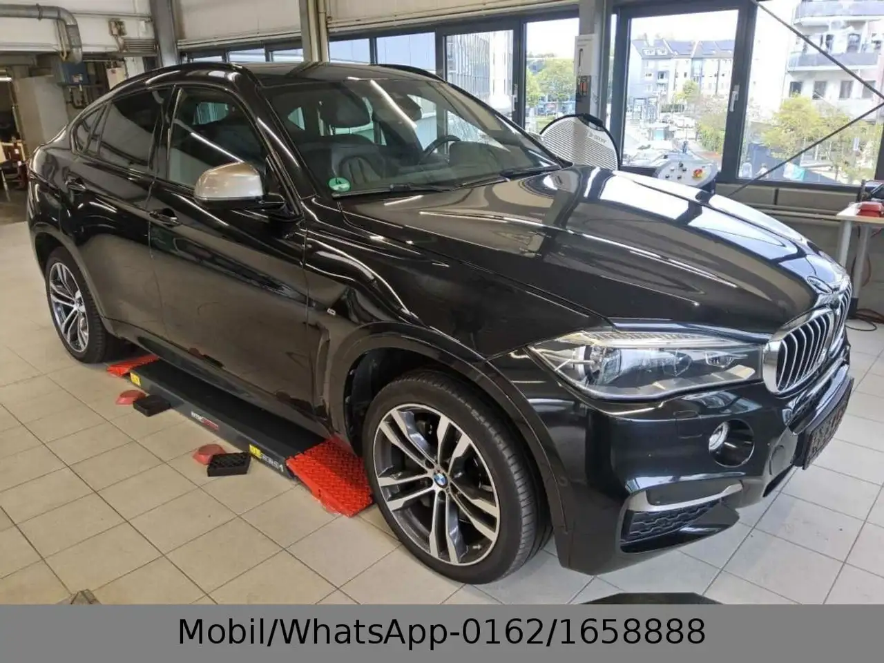 BMW X6 M50 d Head-up AHK Soft-Close — photo 1 of 9