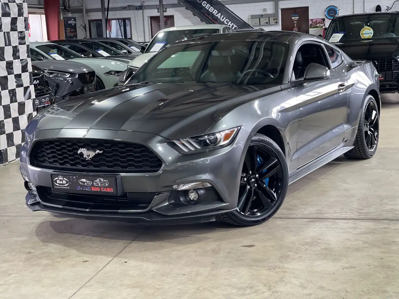 Ford Mustang FASTBACK+DE FAHRZ+UNFALLFREI+KAMERA+SHZ+GARANTIE — photo 1 of 39