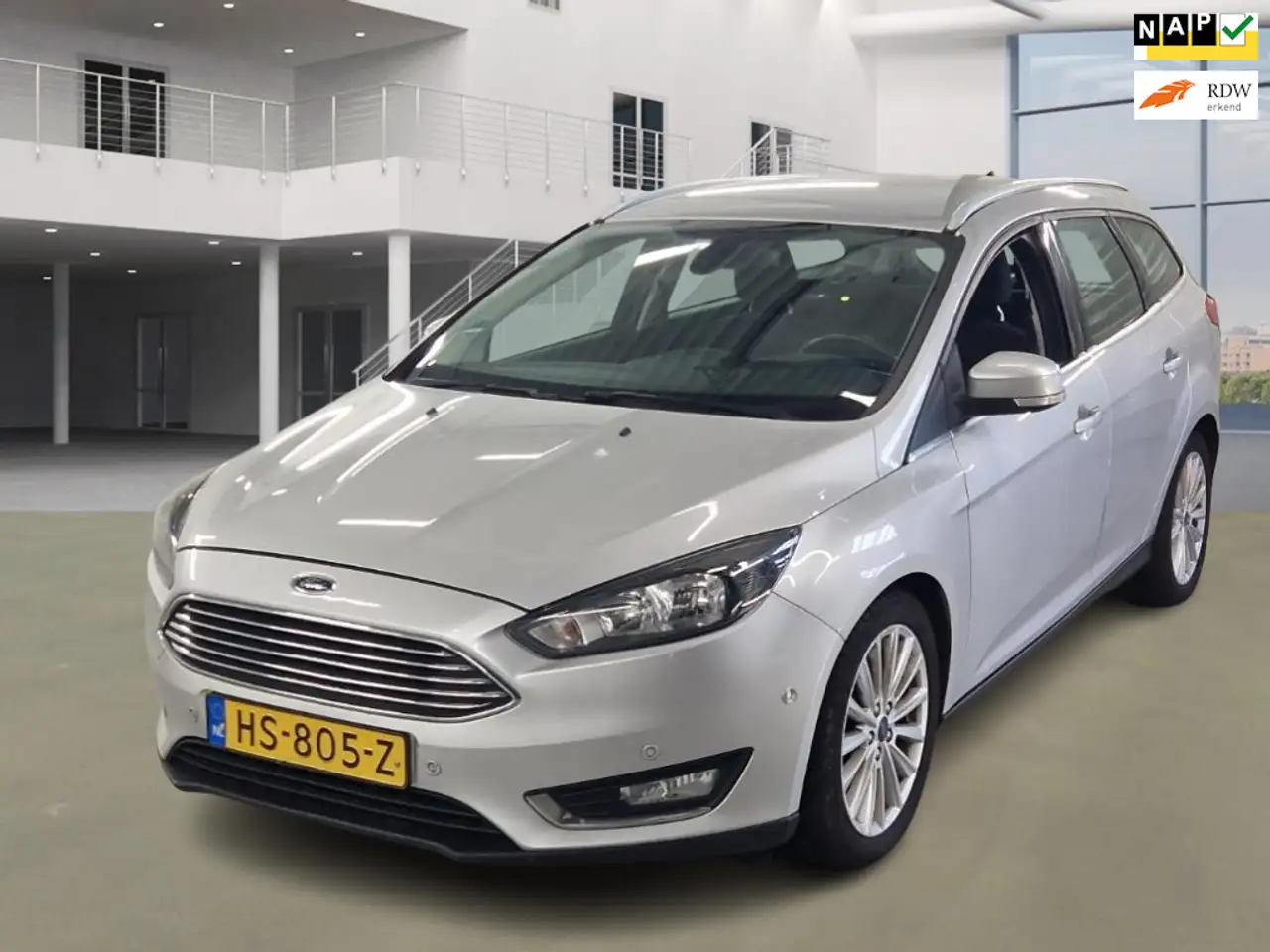 Ford Focus Wagon 1.5 Titanium Edition|1STE EIG|NAP|AUT|NAVI|P — photo 1 of 18