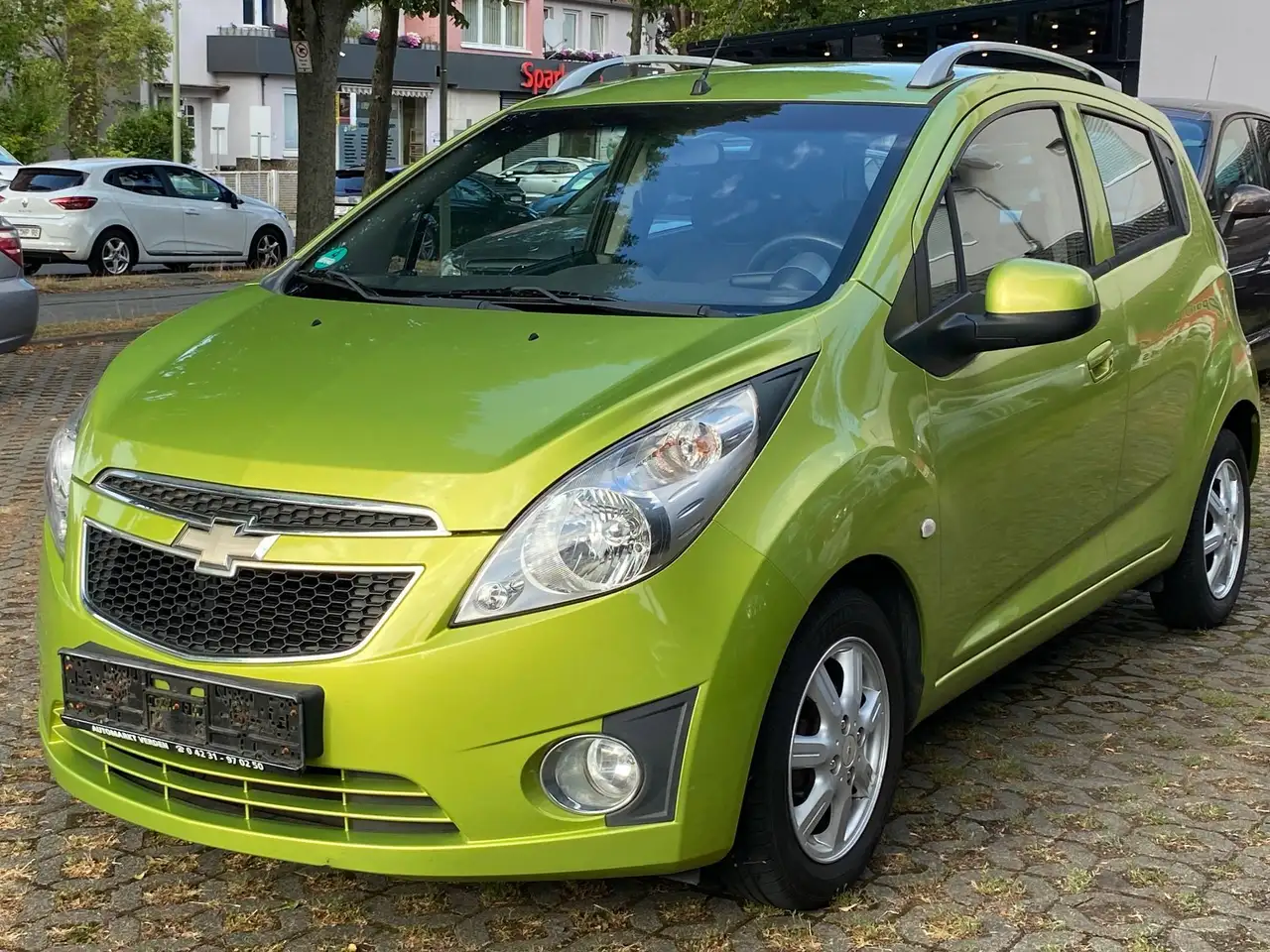 Chevrolet Spark LS, 8-fach bereift, Scheckheft gepflegt — photo 1 of 17